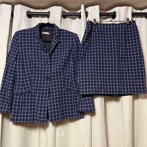 Nicola Suit, designed in Italy, navy blue, jacket and skirt lined.